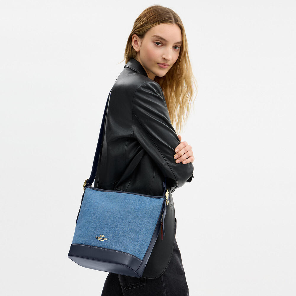 Coach Outlet Jude Duffle Bag In Signature Denim